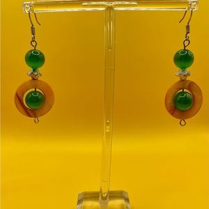 Silver dangle earrings with green beads and gold resin ring